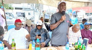 Mr Emenike Nwokeoji (3rd from right) standing up to address the members of Apapa chapter during his presidential campaign in Apapa on Wednesday