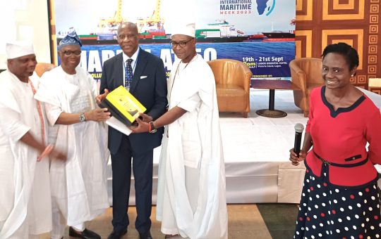 Capt Emmanuel Iheanacho (3rd from left) being presented with the Lifetime Achievement Award by the representative of Oba Oniru of Iru Land, Chief Olumide Oniru (2nd right) and other chiefs from the palace, while Mrs Oritsematosan Edodo-Emore, Chief Executive Officer of Zoe Maritime Resources Ltd, convener of the LIMWEEK watches