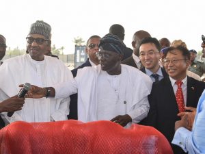 L-R President Muhammadu Buhari, Governor of Lagos State, Mr Babajide Sanwo-Olu, the Managing Director/CEO Lekki Port LFTZ Enterprise Limited, Du Ruogang and the Chinese Ambassador to Nigeria Cui Jianchun during the official Commissioning of the Lekki Deep Sea Port in Lagos on Monday