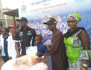 L-R, The Lead Instructor, Dolphin Swim School Mrs Aderoju Ope-Ajayi, The representative of SUBEB in Epe, Mrs Temidayo Oyeniran, the General Manager, Lagos State Waterways Authority (LASWA), Mr Oluwadamilola Emmanuel, one of the trainee Gafar Waheed and the Education Secretary, Epe Local Government, Otunba Idowu Shittu during the 3rd edition of swimming programme organised by LASWA in Epe on Thursday.  