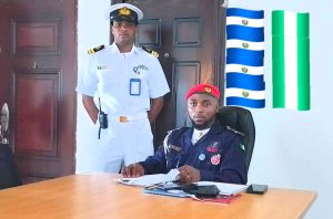 The Commander General of Sail Navy (seated) Captain JohnLinus Okoronkwo