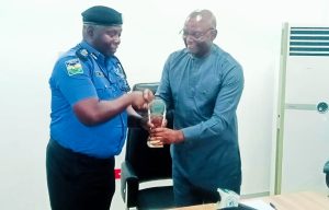 AIG Maritime, Yekini Adio Ayoku receiving a souvenir from the Executive Secretary of the Nigerian Shippers Council, Hon Emmanuel Jime when the police boss and his team visited the Shippers Council headquarters on familiarization visit on Thursday
