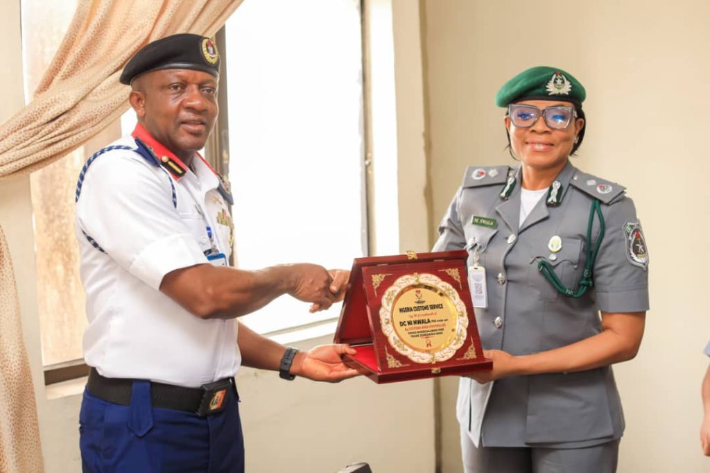 The Ag. CAC with the Commandant *CE Okarazu* at the Civil Defence Cross River State Command Headquarters.