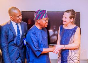Minister of Marine and Blue Economy, Adegboyega Oyetola, CON in a handshake with the Head of the International Transport Workers Federation (ITF), Seafarers Trust, Katie Higginbottom while Director General, Nigerian Maritime Administration and Safety Agency, NIMASA, Dr Bashir Jamoh, OFR looks on during a meeting with the Honourable Minister in Lagos.