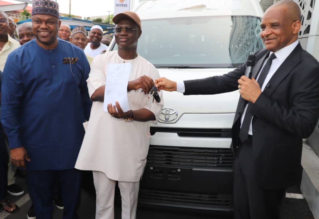 R-L: Director General, of Nigerian Maritime Administration and Safety Agency (NIMASA), Dr Bashir Jamoh, OFR; presenting the keys to a 16 seater and Hilux vehicle to the President General, Maritime Workers’ Union of Nigeria, Comrade Adewale Adeyanju; while Executive Director Maritime Labour and Cabotage Services, Engr. Victor Ochei looks on. The handing over took place at the headquarters of NIMASA in Lagos.