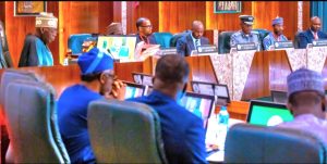 President Bola Tinubu (left) presiding over a meeting to launch the steering committee for a National Single Widow Project in Abuja on Tuesday