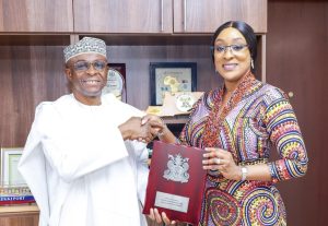 L-R: NPA Managing Director, Dr. Abubakar Dantsoho, and NDPHC Managing Director, Engr. Jennifer Adighije, exchange handshakes during a courtesy visit by the NDPHC management team to the NPA headquarters in Lagos.
