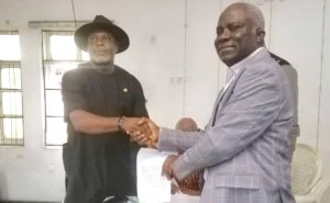 The National president, Mr Emenike Nwokeoji with Chuks Nnanna