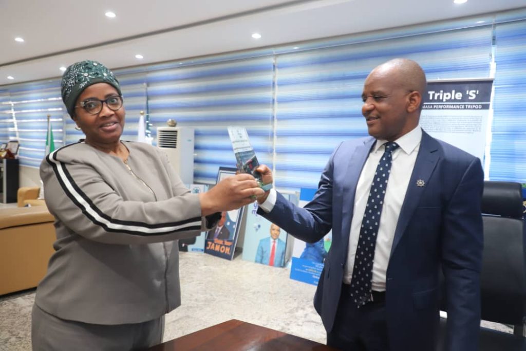 Director General, Nigerian Maritime Administration and Safety Agency (NIMASA), Dr Bashir Jamoh OFR (right) receiving the 'Outstanding Service to Taxation Profession' award conferred on him by the Chartered Institute of Taxation of Nigeria, CITN from Director Internal Audit NIMASA, Mrs Olamide Odusanya at the NIMASA headquarters in Lagos